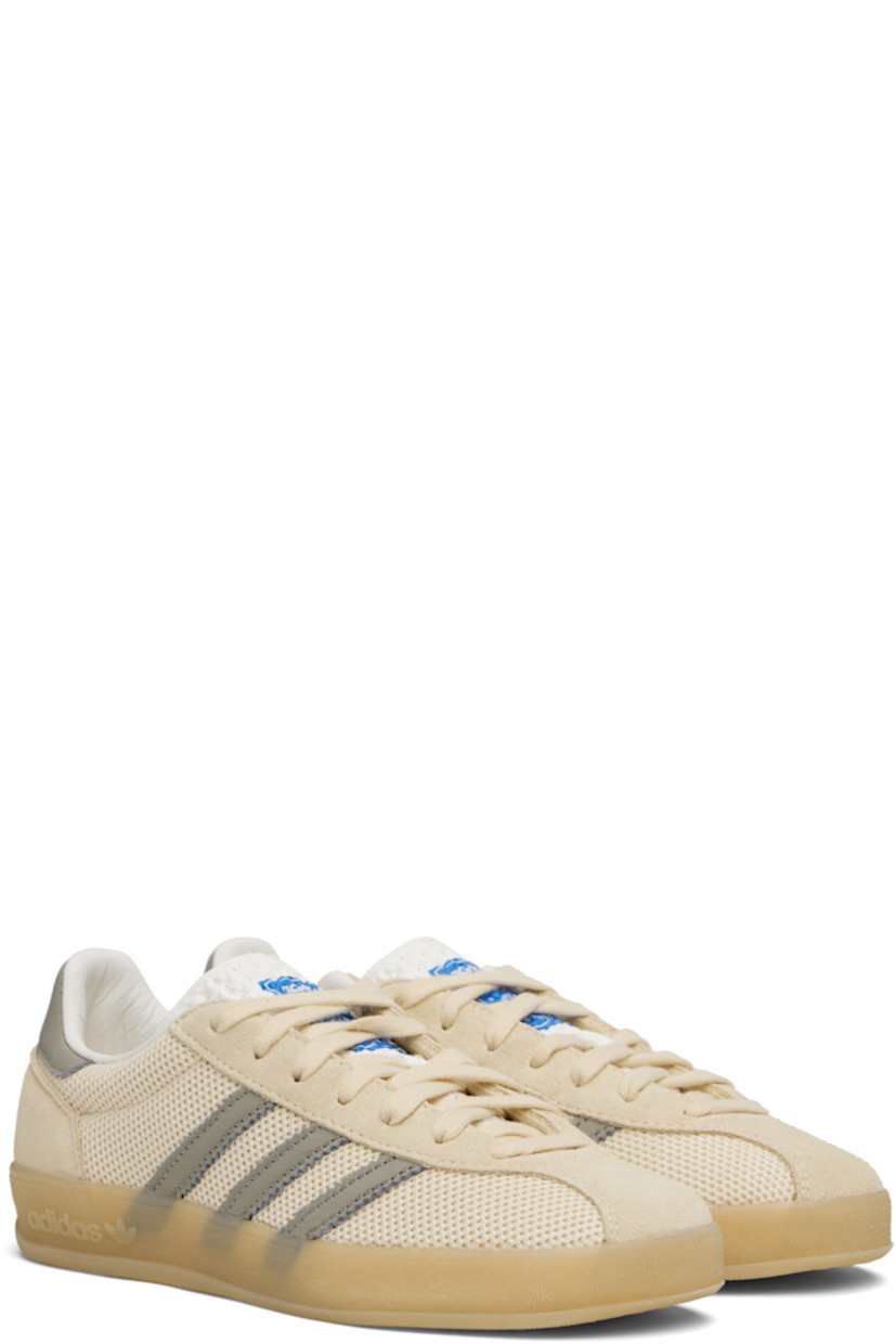 Low-top mesh sneakers.

· Suede trim throughout
· Lace-up closure
· Logo printed at perforated tongue
· Padded collar
· Signature serrated stripes at sides
· Logo printed at heel tab
· Buffed leather lining
· Logo embossed at textured rubber midsole
· Treaded rubber sole

Supplier color: Yellow/Supplier colour/Charcoal