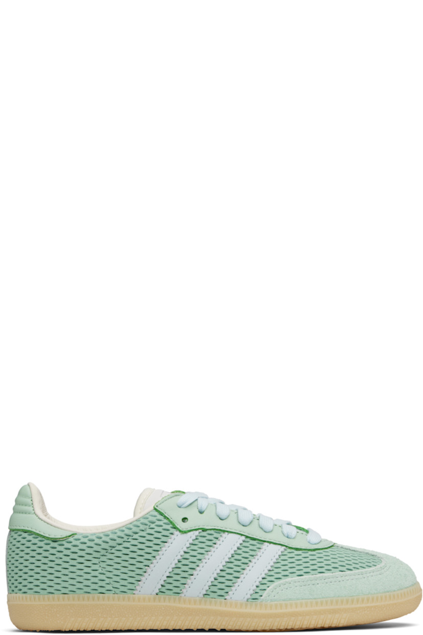 Low-top perforated leather and buffed leather sneakers.

· Nubuck trim at toe
· Lace-up closure
· Logo printed at tongue
· Padded tongue and collar
· Signature serrated stripes at sides
· Quilted heel tab
· Mesh lining
· Treaded rubber sole

Supplier color: Hazy green/Sky tint/Off white