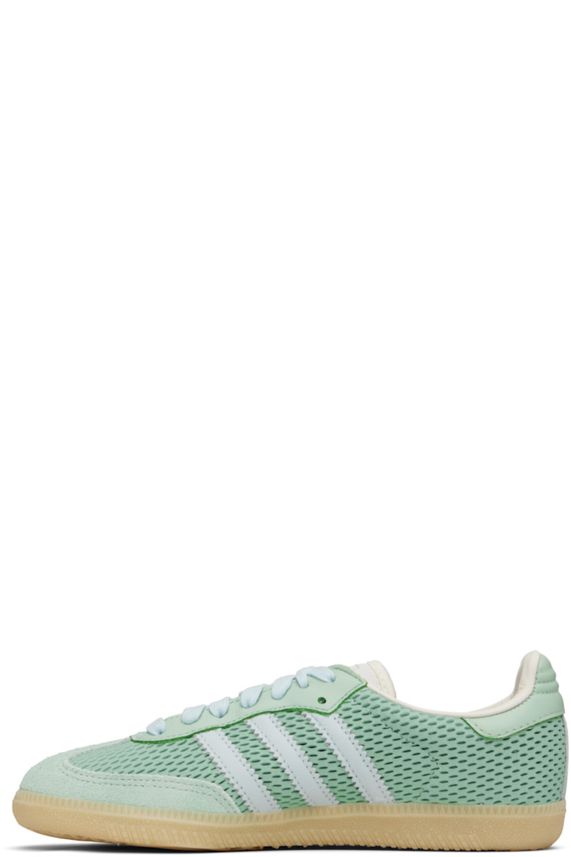 Low-top perforated leather and buffed leather sneakers.

· Nubuck trim at toe
· Lace-up closure
· Logo printed at tongue
· Padded tongue and collar
· Signature serrated stripes at sides
· Quilted heel tab
· Mesh lining
· Treaded rubber sole

Supplier color: Hazy green/Sky tint/Off white