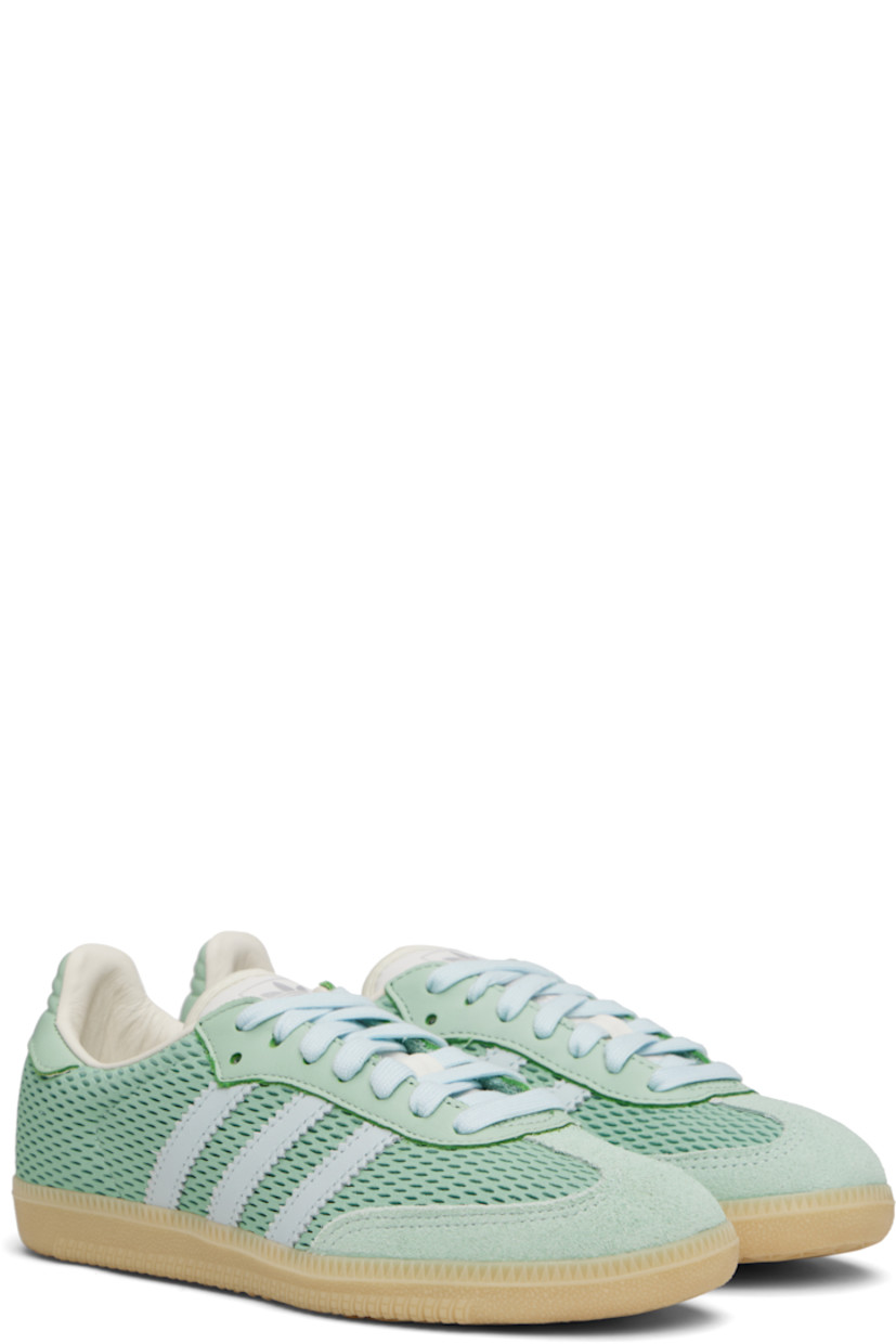 Low-top perforated leather and buffed leather sneakers.

· Nubuck trim at toe
· Lace-up closure
· Logo printed at tongue
· Padded tongue and collar
· Signature serrated stripes at sides
· Quilted heel tab
· Mesh lining
· Treaded rubber sole

Supplier color: Hazy green/Sky tint/Off white