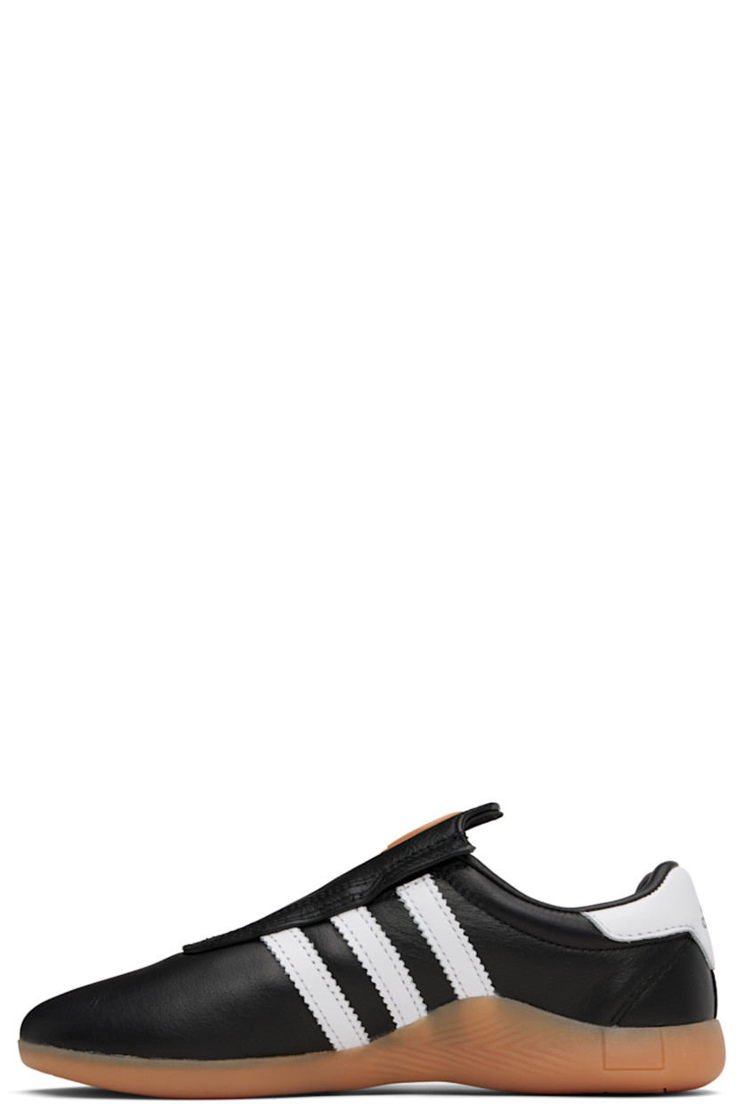 Low-top buffed leather slip-on sneakers.

· Cutout and rubberized trim at vamp
· Concealed elasticized gussets
· Padded collar
· Signature serrated stripes at sides
· Logo embossed at heel tab
· Buffed leather and mesh lining
· Treaded rubber sole

Supplier color: Core black/Cloud white/Gum
