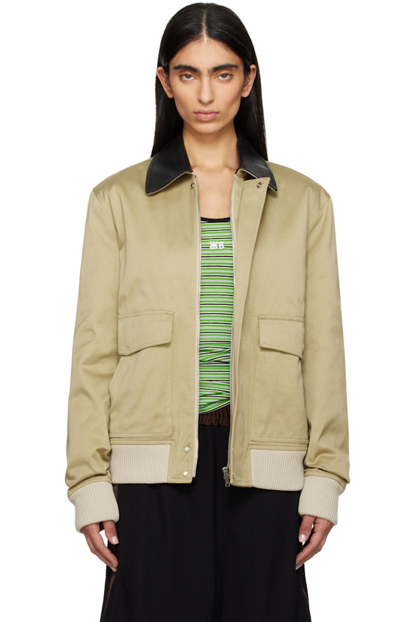 Cotton sateen jacket. 

· Leather trim at spread collar 
· Concealed zip closure with press-stud placket
· Flap and welt pockets
· Rib-knit hem and cuffs 
· Central seam at back 
· Welt pocket at interior 
· Full quilted viscose twill lining 

Supplier color: Hunter