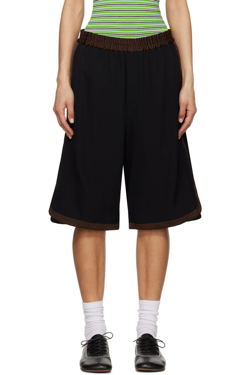 Relaxed-fit wool twill shorts. Satin trim throughout.

· Elasticized waistband
· Four-pocket styling 
· Mock fly 
· Vented cuffs

Supplier color: Black/Brown