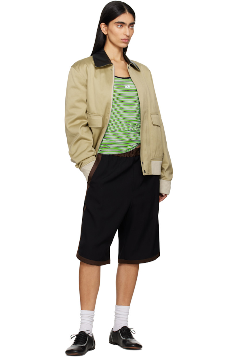 Relaxed-fit wool twill shorts. Satin trim throughout.

· Elasticized waistband
· Four-pocket styling 
· Mock fly 
· Vented cuffs

Supplier color: Black/Brown