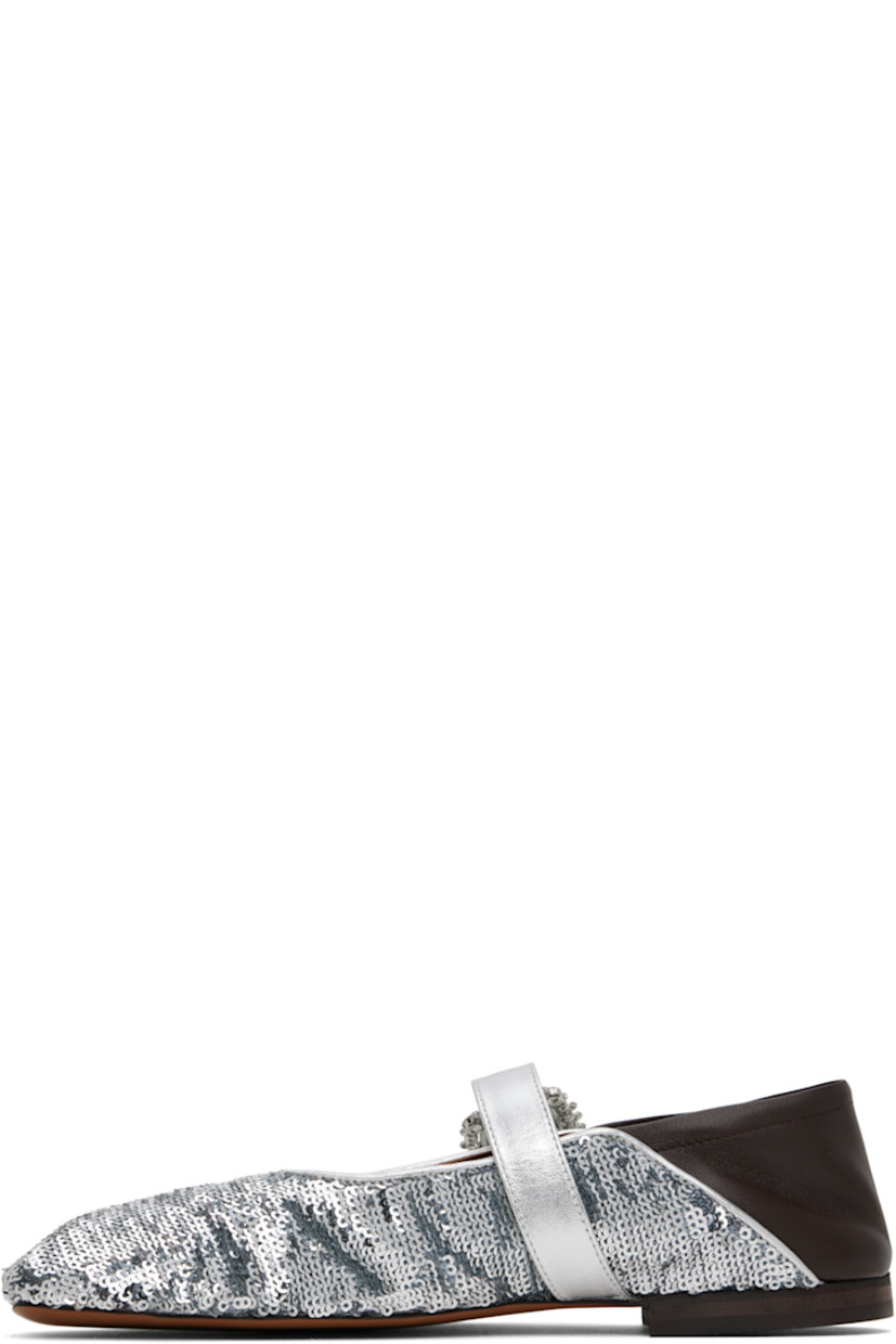 Sequinned plain-woven viscose and grained leather ballerina flats in silver tone and brown. 

· Square toe
· Adjustable crystal-cut pin-buckle strap
· Collapsible heel counter
· Suede and buffed leather lining
· Stacked leather block heel with rubber injection
· Polished leather sole

Supplier color: Silver