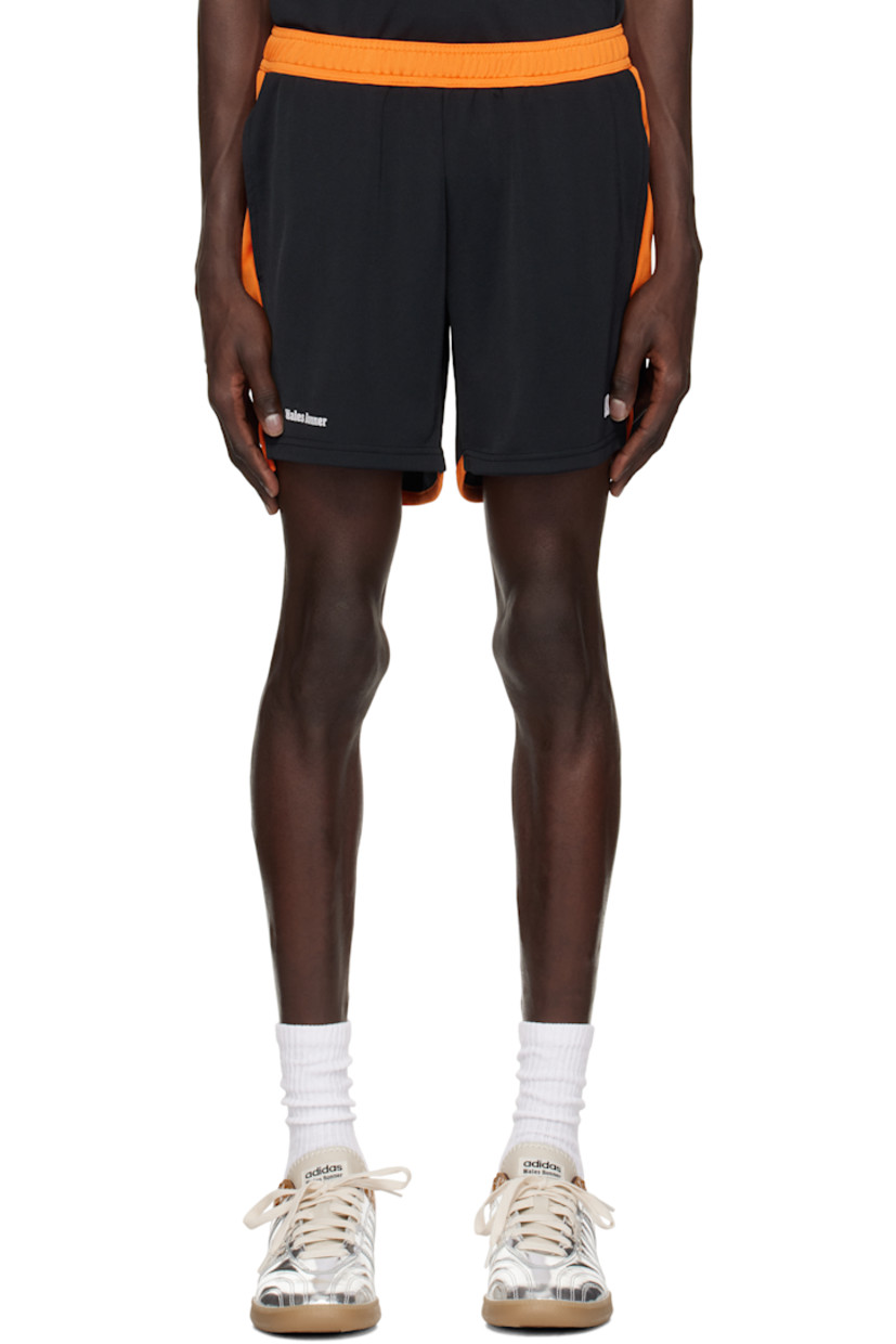 Polyester interlock jersey shorts.

· Colorblocked construction
· Concealed drawstring at elasticized waistband
· Two-pocket styling
· Logo printed at cuffs
· Vented outseams

Supplier color: Black/Orange