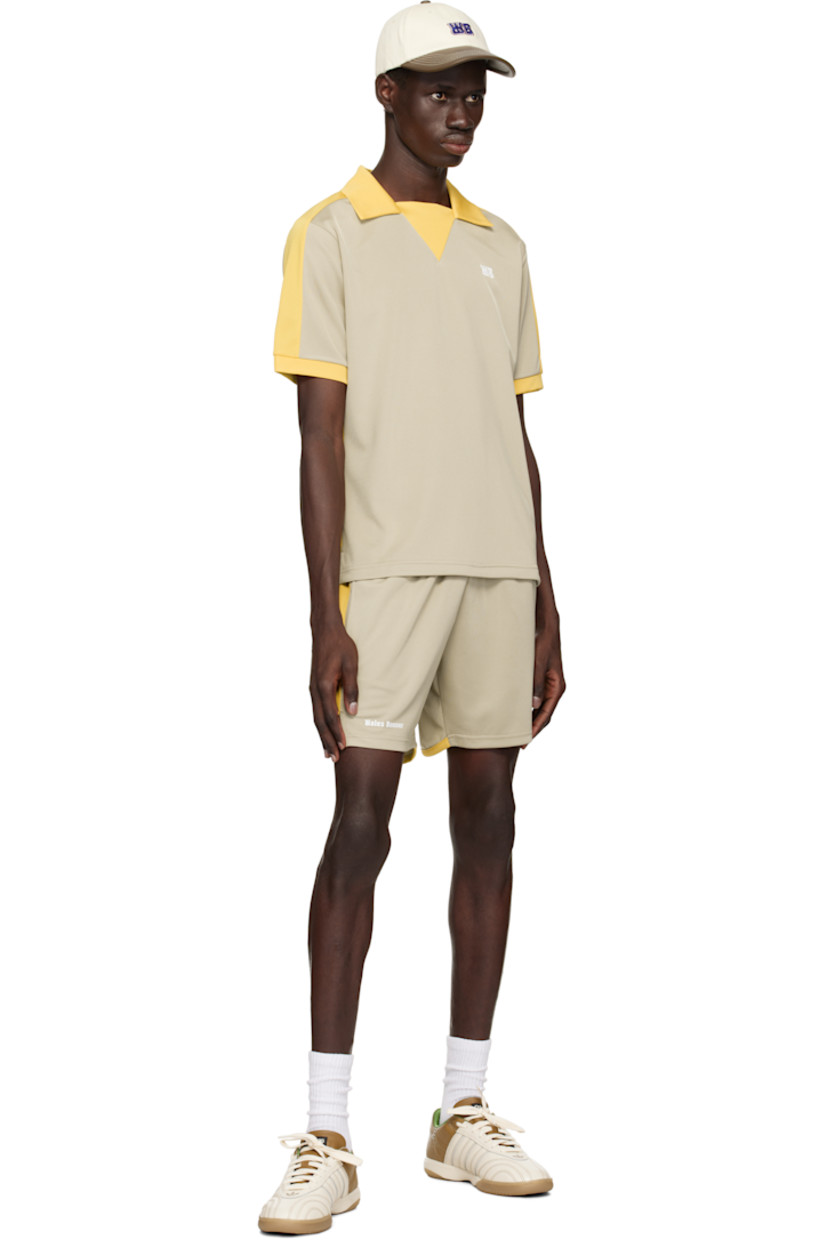 Polyester interlock jersey shorts.

· Colorblocked construction
· Concealed drawstring at elasticized waistband
· Two-pocket styling
· Logo printed at cuffs
· Vented outseams

Supplier color: Beige/Yellow