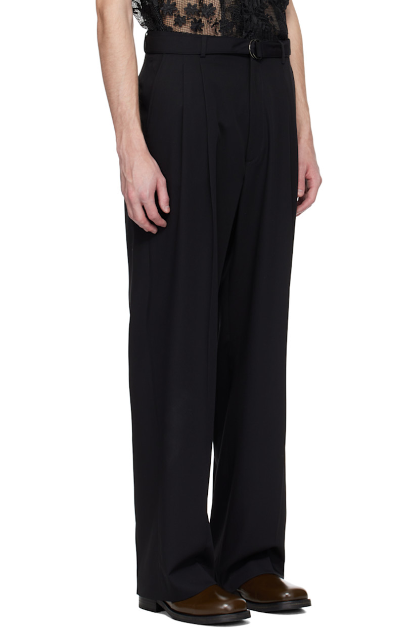 Loose-fit virgin wool twill trousers.

· Belt loops and detachable cinch belt 
· Four-pocket styling
· Zip fly
· Pleats at front
· Creased legs
· Darts at back waistband

Supplier color: Black