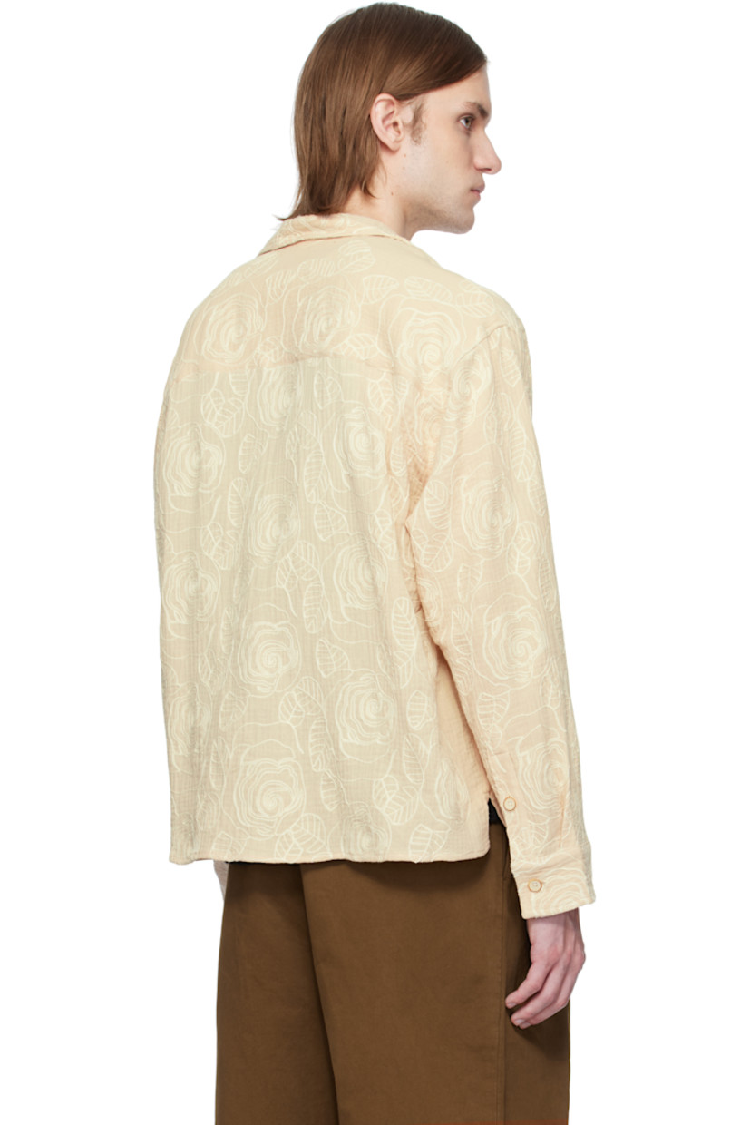 Polyester- and cotton-blend gauze shirt. Floral pattern embroidered throughout.

· Open spread collar
· Button closure
· Patch pocket
· Buttoned barrel cuffs
· Vented side seams

Supplier color: Cream