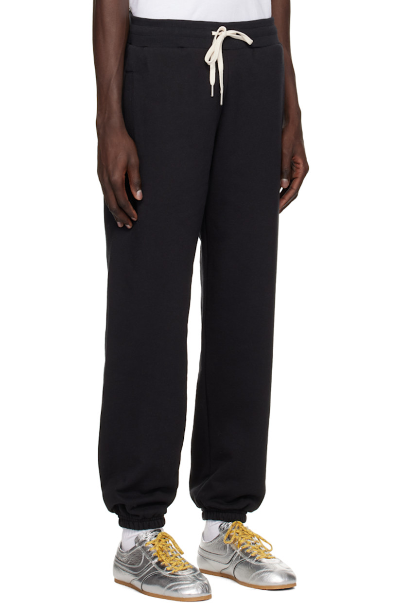 French terry sweatpants.

· Oversized
· Drawstring at waistband
· Three-pocket styling
· Elasticized cuffs

Supplier color: Black