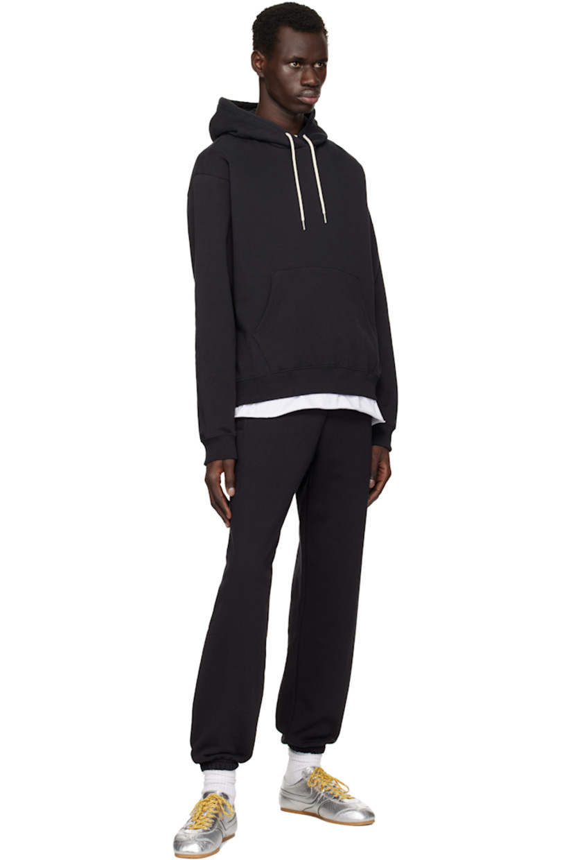French terry sweatpants.

· Oversized
· Drawstring at waistband
· Three-pocket styling
· Elasticized cuffs

Supplier color: Black