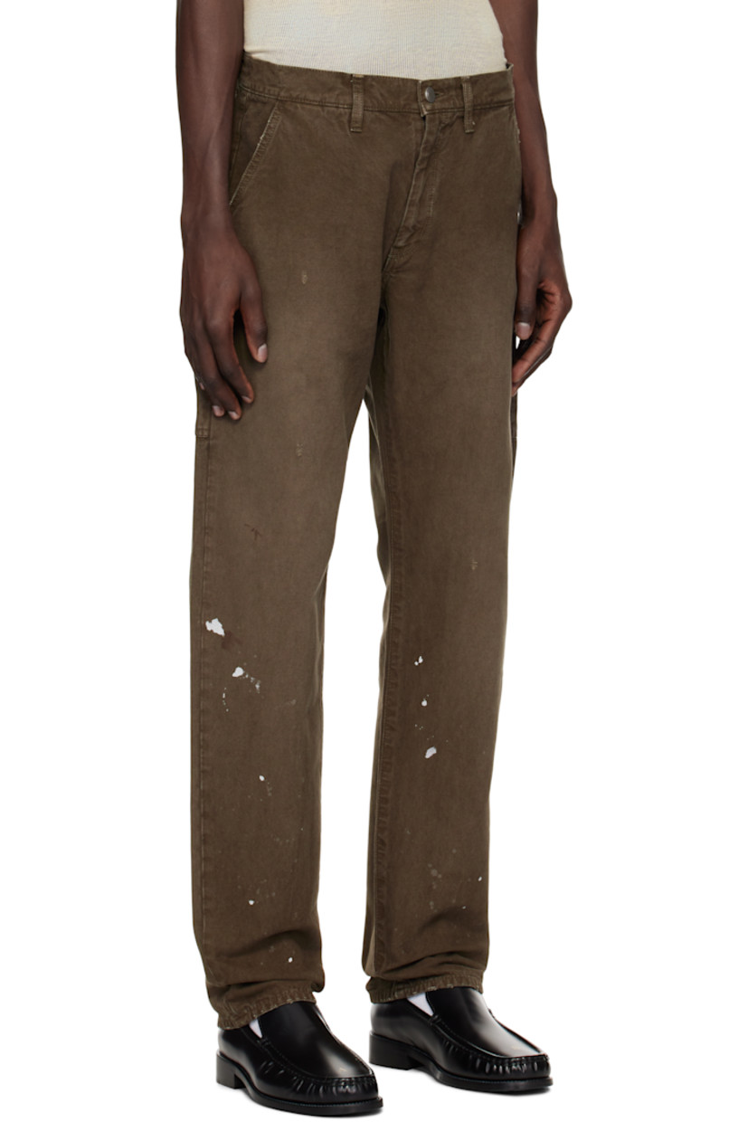 Yarn-dyed cotton canvas trousers. Paint splatters and subtle distressing throughout.

· Belt loops
· Four-pocket styling
· Zip fly
· Patch pockets at outseam
· Patch pocket and hammer loop at outseam

Supplier color: Cedar