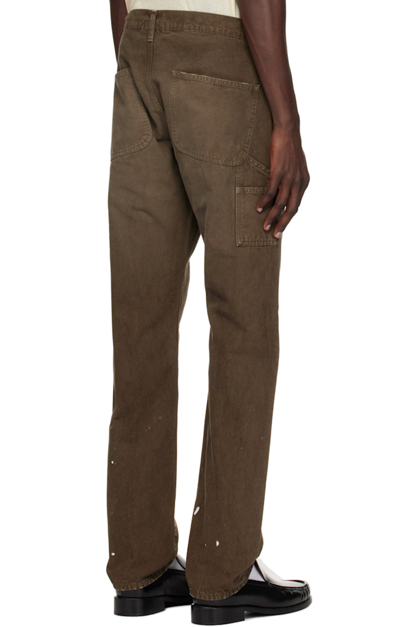Yarn-dyed cotton canvas trousers. Paint splatters and subtle distressing throughout.

· Belt loops
· Four-pocket styling
· Zip fly
· Patch pockets at outseam
· Patch pocket and hammer loop at outseam

Supplier color: Cedar