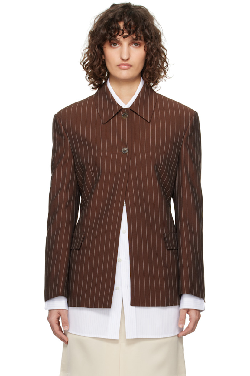 Plain-woven viscose- and lyocell-blend jacket. Pinstripes throughout. 

· Spread collar
· Button closure
· Darts at front
· Flap pockets
· Padded shoulders
· Vented cuffs
· Central vent at back hem
· Partially lined

Supplier color: Red brown