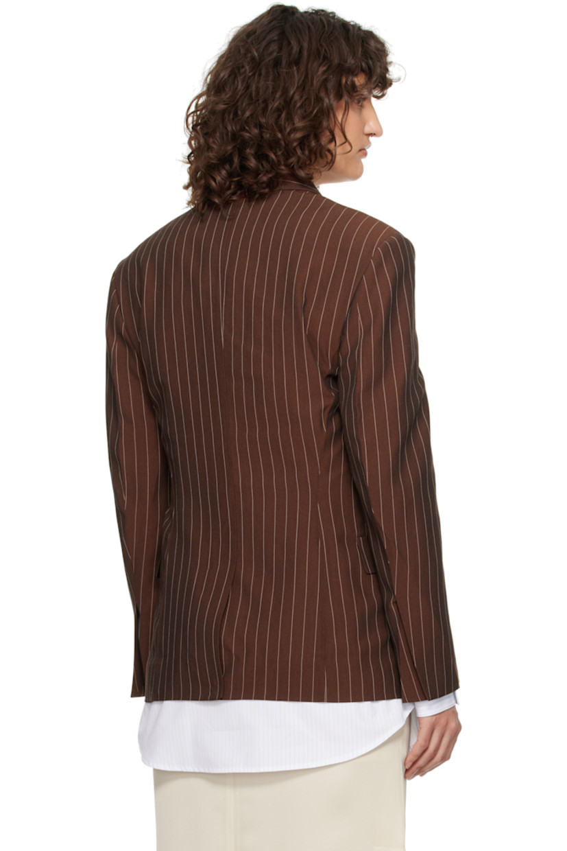 Plain-woven viscose- and lyocell-blend jacket. Pinstripes throughout. 

· Spread collar
· Button closure
· Darts at front
· Flap pockets
· Padded shoulders
· Vented cuffs
· Central vent at back hem
· Partially lined

Supplier color: Red brown