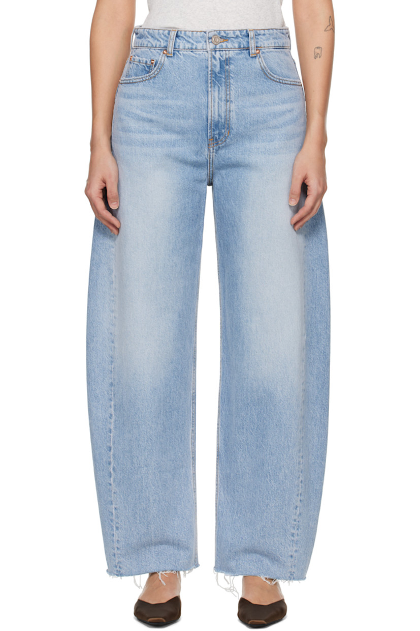 Non-stretch denim jeans. Fading, whiskering, and subtle distressing throughout.

· High-rise
· Belt loops
· Five-pocket styling
· Zip fly
· Frayed edge at cuffs
· Curved outseams
· Leather logo patch at back waistband
· Logo-engraved copper-tone hardware
· Contrast stitching in tan

Supplier color: Light blue