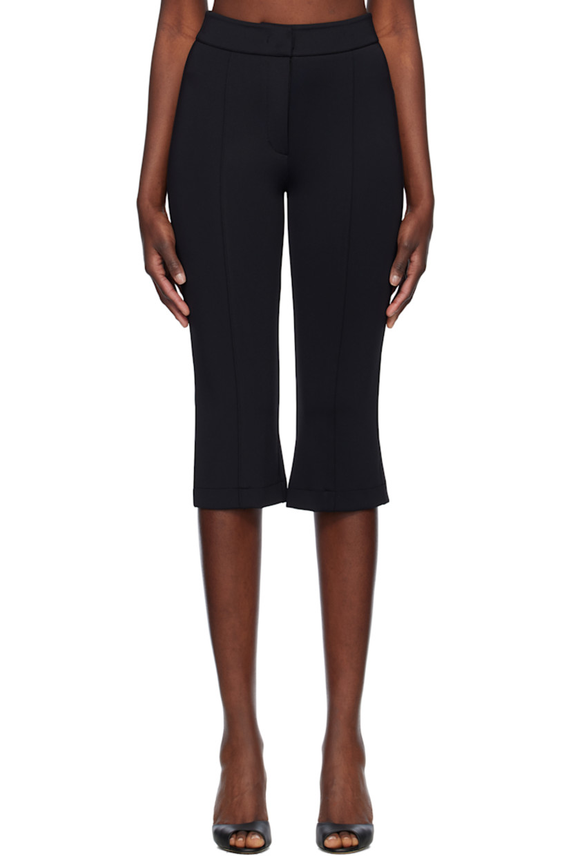 Stretch nylon jersey trousers. 

· Paneled construction
· Zip fly
· Pintuck at legs
· Vent at back cuffs

Supplier color: Black