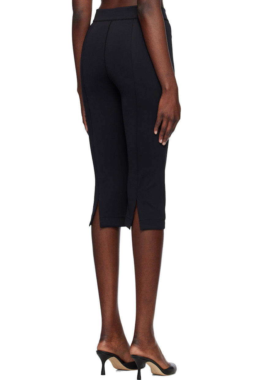 Stretch nylon jersey trousers. 

· Paneled construction
· Zip fly
· Pintuck at legs
· Vent at back cuffs

Supplier color: Black