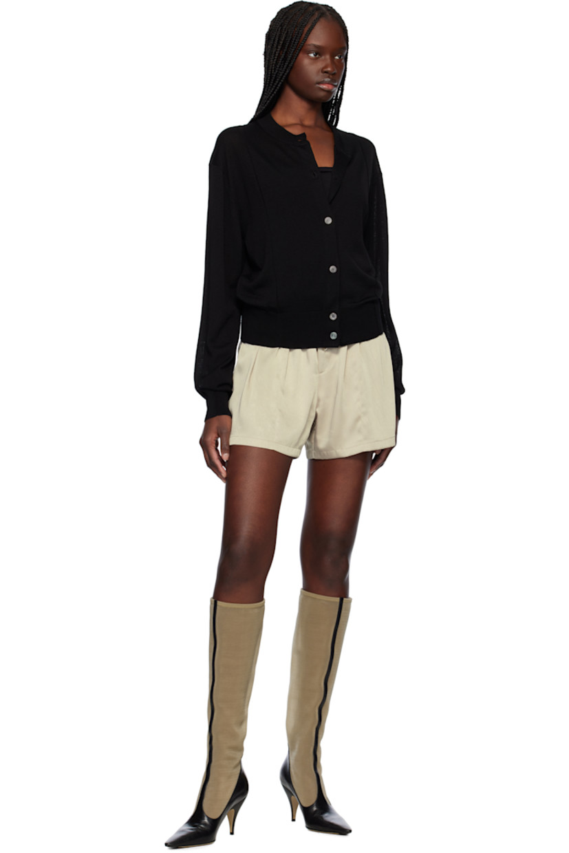 Crinkled polyester satin shorts.

· Elasticized waistband
· Logo patch at mock fly
· Partially lined

Supplier color: Sepia beige