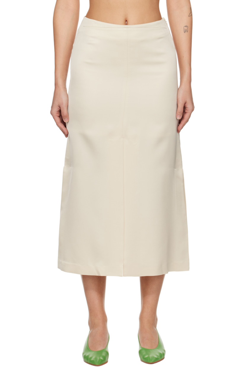 Stretch rayon- and polyester-blend sateen midi skirt. 

· Slit at front hem
· Pleats at side seams
· Concealed zip closure at side
· Darts at back waist
· Fully lined

Supplier color: Cream