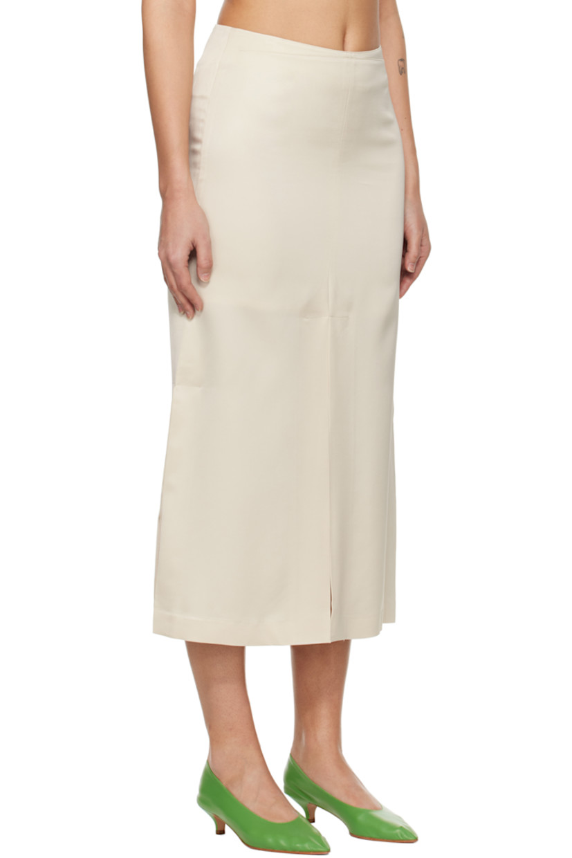 Stretch rayon- and polyester-blend sateen midi skirt. 

· Slit at front hem
· Pleats at side seams
· Concealed zip closure at side
· Darts at back waist
· Fully lined

Supplier color: Cream