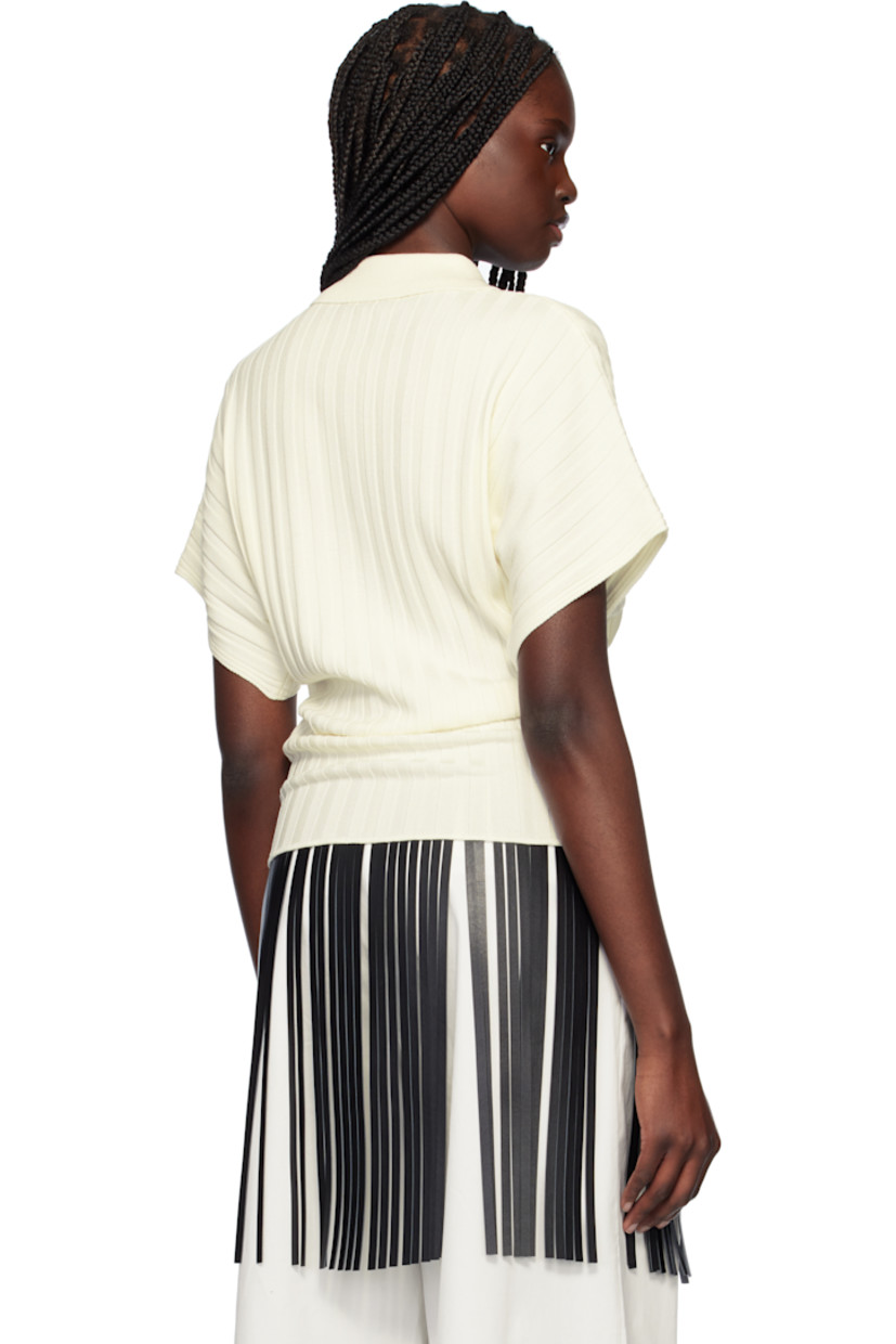 Rib-knit viscose-blend polo.

· Spread collar
· Three-button placket
· Dolman sleeves
· Horn hardware

Supplier color: Ivory