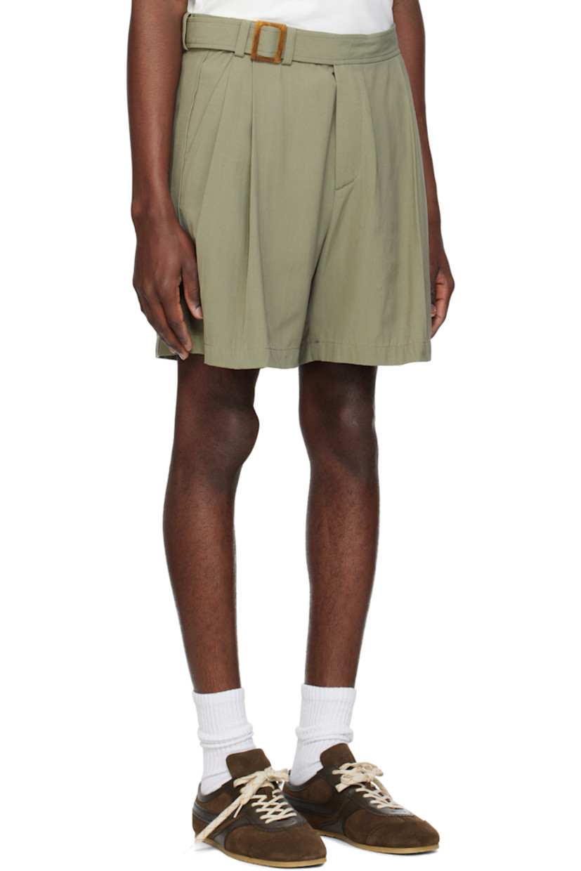 Plain-woven viscose-blend shorts.

· Integrated belt at belt loops
· Four-pocket styling
· Zip fly
· Pleats at waistband
· Darts at back waistband

Supplier color: Dark khaki