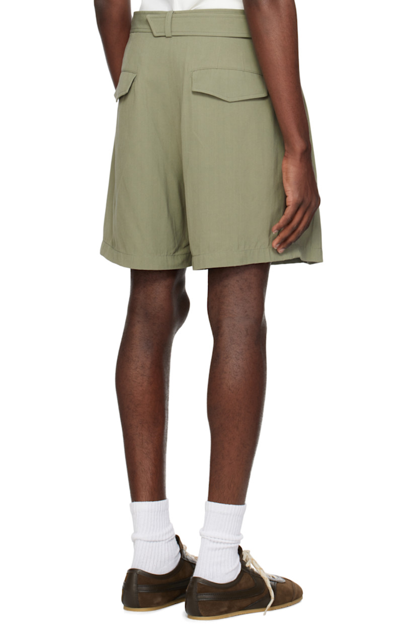 Plain-woven viscose-blend shorts.

· Integrated belt at belt loops
· Four-pocket styling
· Zip fly
· Pleats at waistband
· Darts at back waistband

Supplier color: Dark khaki