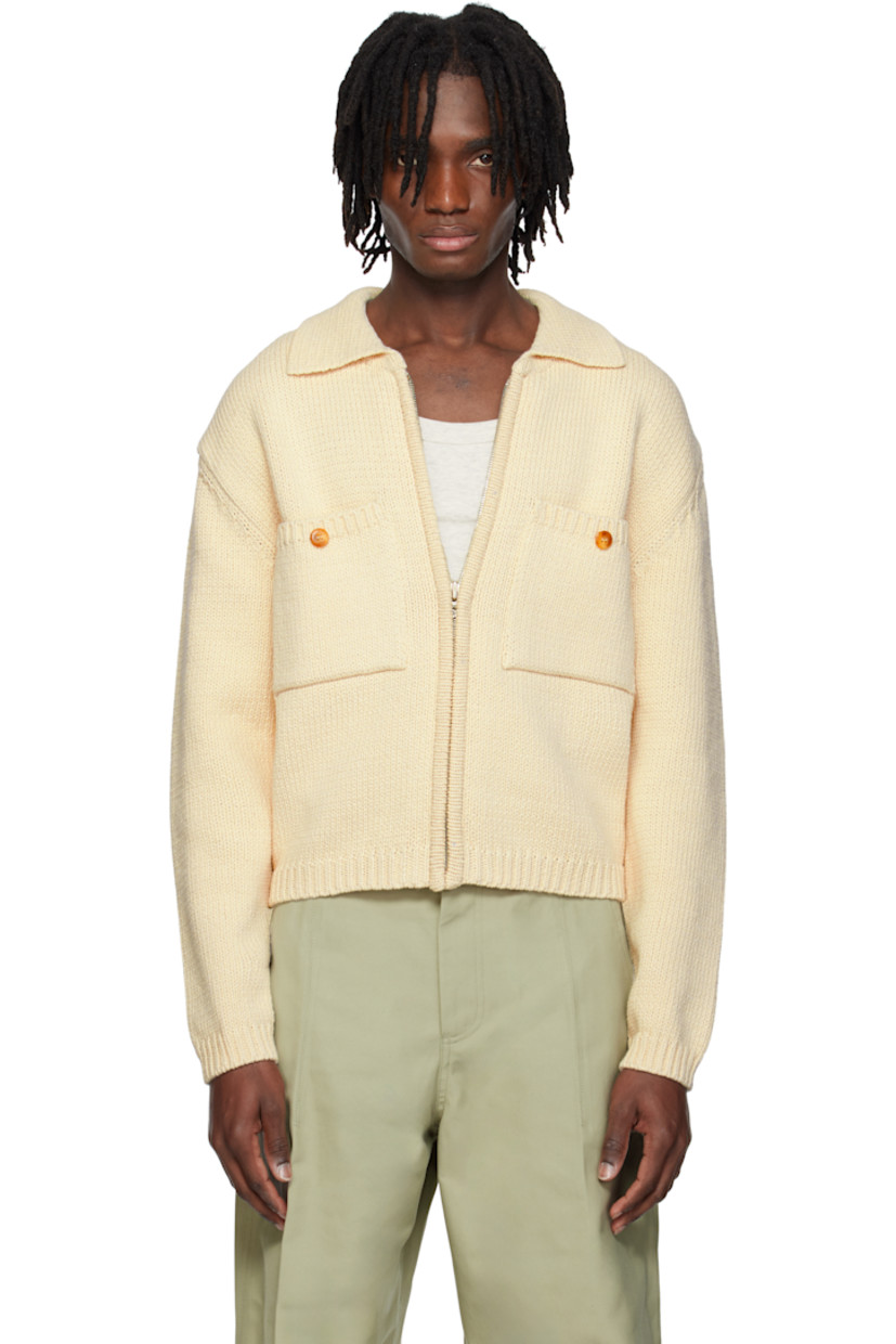 Knit cotton cardigan.

· Spread collar
· Zip closure
· Patch pockets
· Rib-knit hem and cuffs
· Dropped shoulders

Supplier color: Cream
