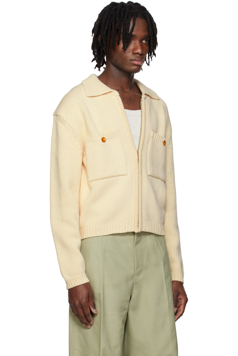 Knit cotton cardigan.

· Spread collar
· Zip closure
· Patch pockets
· Rib-knit hem and cuffs
· Dropped shoulders

Supplier color: Cream