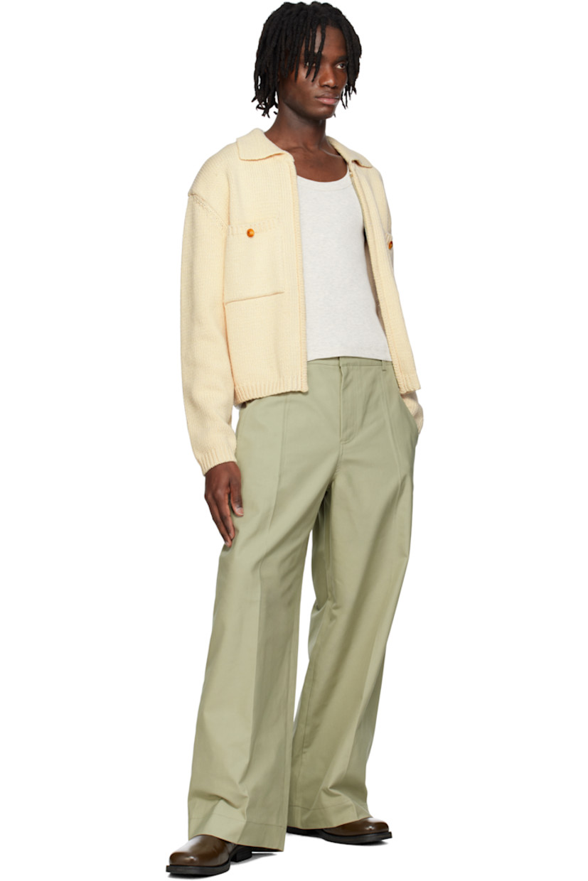 Knit cotton cardigan.

· Spread collar
· Zip closure
· Patch pockets
· Rib-knit hem and cuffs
· Dropped shoulders

Supplier color: Cream