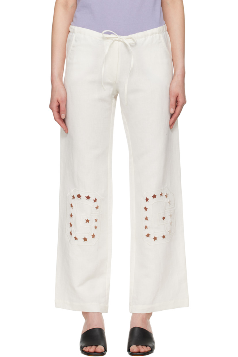 Plain-woven linen- and cotton-blend lounge pants. 

· Drawstring at waistband 
· Two-pocket styling 
· Zip fly 
· Graphic cutouts and embroidered logo at knees

Supplier color: White