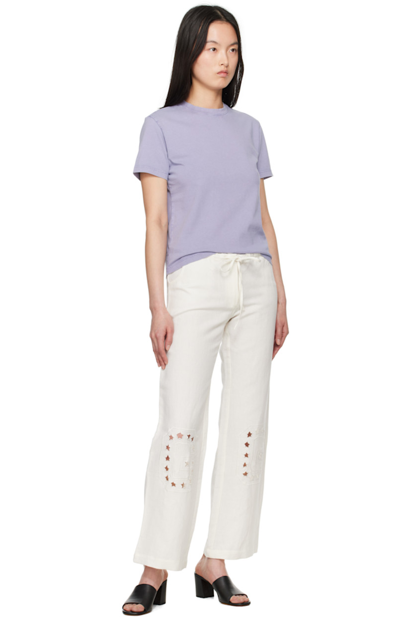 Plain-woven linen- and cotton-blend lounge pants. 

· Drawstring at waistband 
· Two-pocket styling 
· Zip fly 
· Graphic cutouts and embroidered logo at knees

Supplier color: White