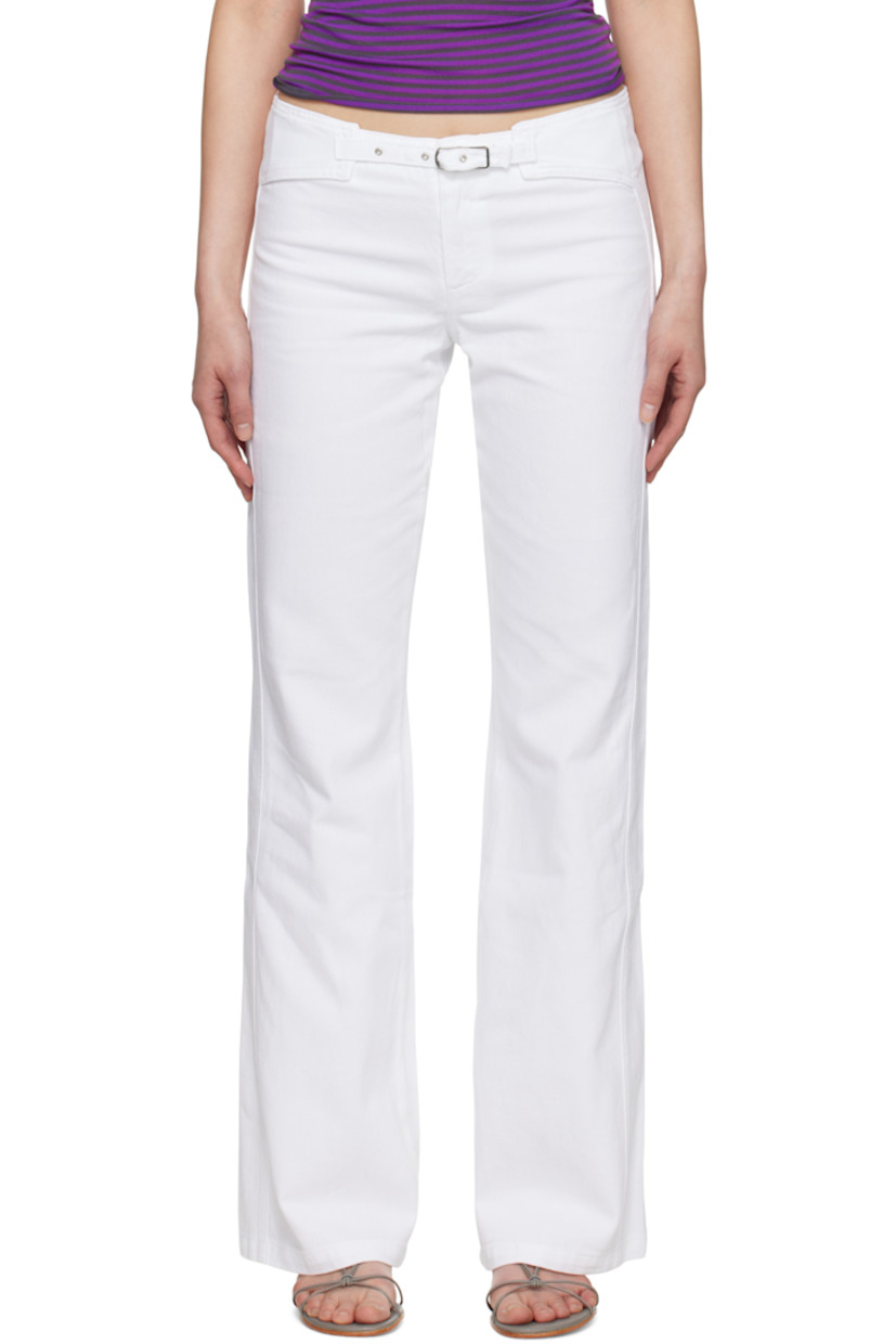 Flared non-stretch denim trousers.

· Mid-rise
· Integrated pin-buckle strap at waistband
· Zip fly
· Silver-tone hardware

Available exclusively at SSENSE.

Supplier color: White