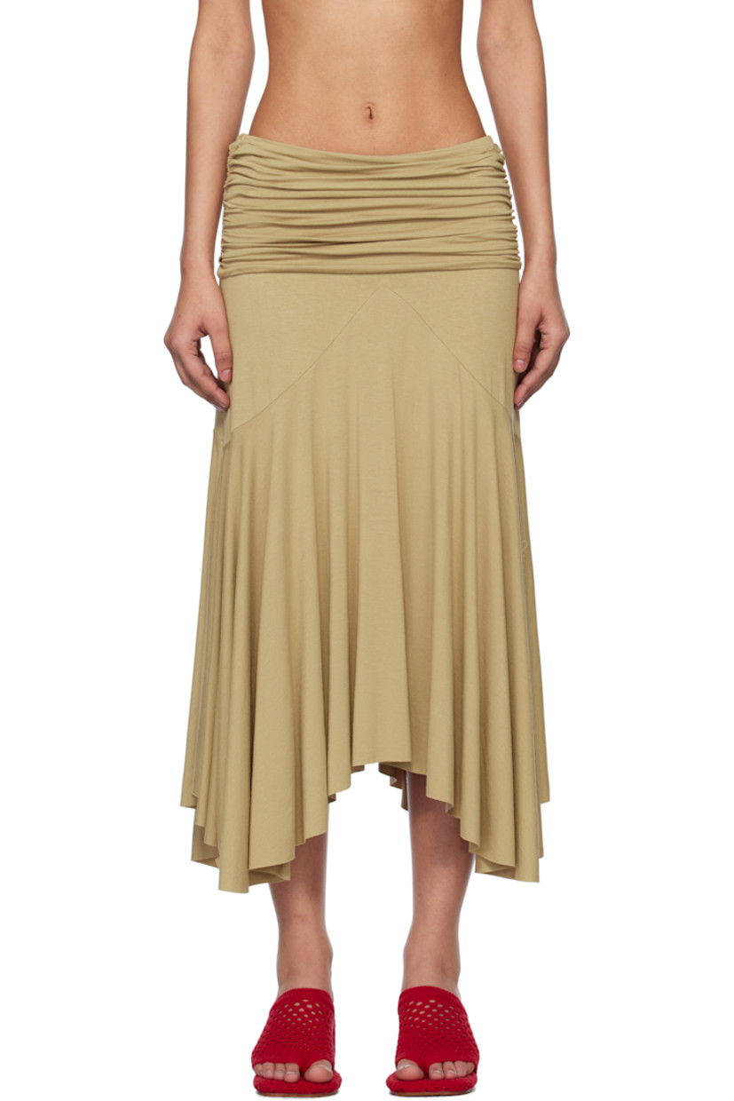 Stretch viscose jersey midi skirt. 

· Elasticized waistband
· Ruching at waist
· Raw edge at handkerchief hem

Supplier color: Beige
