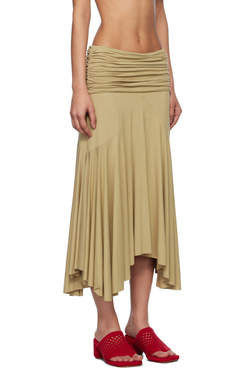 Stretch viscose jersey midi skirt. 

· Elasticized waistband
· Ruching at waist
· Raw edge at handkerchief hem

Supplier color: Beige