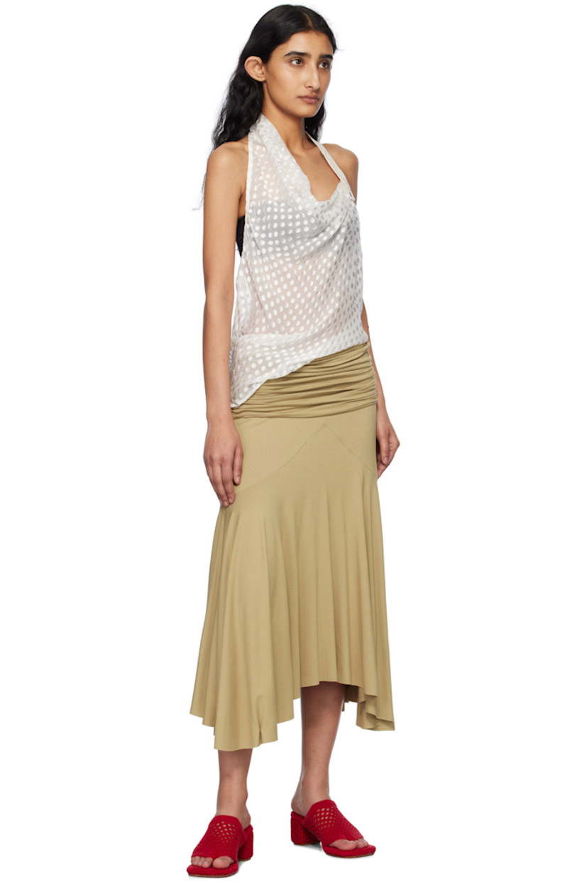 Stretch viscose jersey midi skirt. 

· Elasticized waistband
· Ruching at waist
· Raw edge at handkerchief hem

Supplier color: Beige
