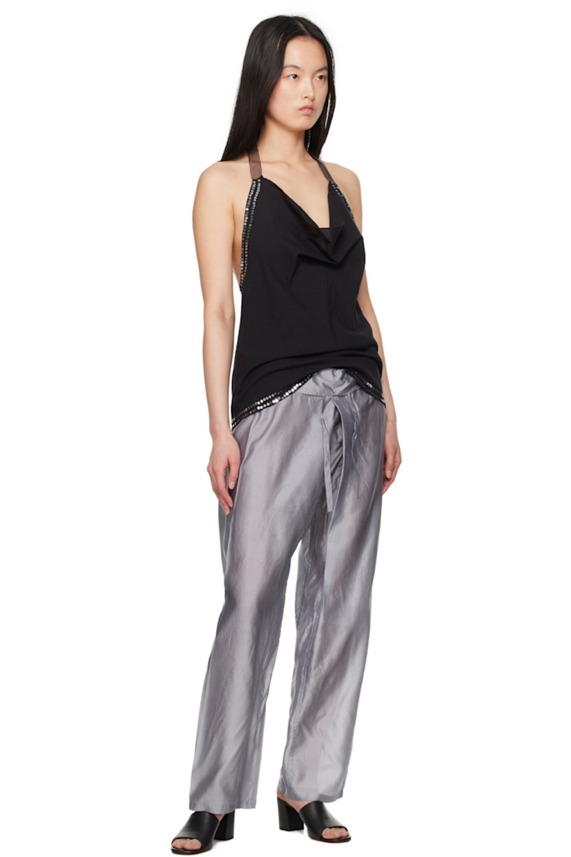 Plain-woven cotton tank top. 

· Cowl neck 
· Sequins at hem and sides 
· Organza self-tie halter strap 
· Low back 

Supplier color: Black