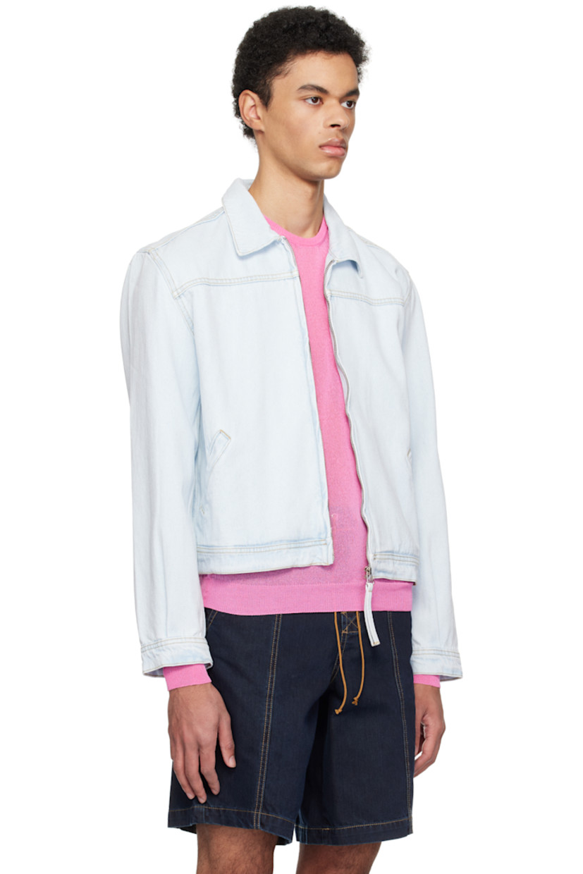 Non-stretch denim jacket.

· Spread collar
· Zip closure
· Welt pockets
· Pleats and adjustable button tab at cuffs
· Adjustable button tabs at back hem
· Contrast stitching in tan

Supplier color: Washed blue