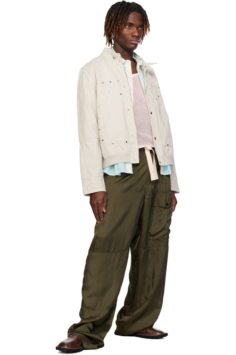 Brushed cotton twill jacket. 

· Paneled construction
· Inset rib-knit stand collar
· Press-stud tab at layered collar
· Zip closure with press-stud placket
· Rivets at front
· Welt pockets
· Rib-knit hem
· Two-button barrel cuffs
· Patch pocket at interior
· Fully lined

Supplier color: Beige