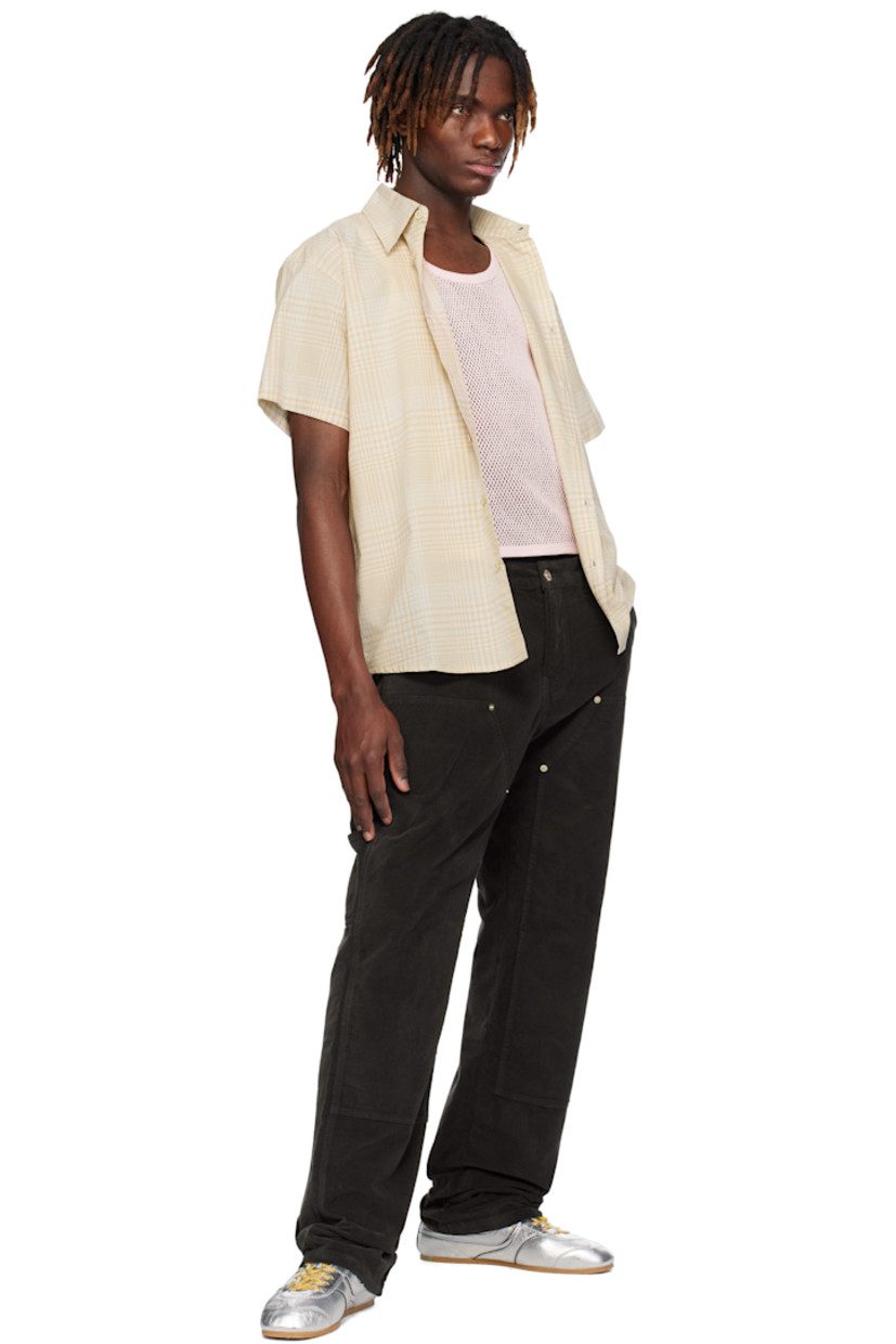 Plain-woven cotton shirt. Check pattern throughout. 

· Spread collar
· Button closure
· Shirttail hem
· Twin pleats at back yoke

Supplier color: Brown