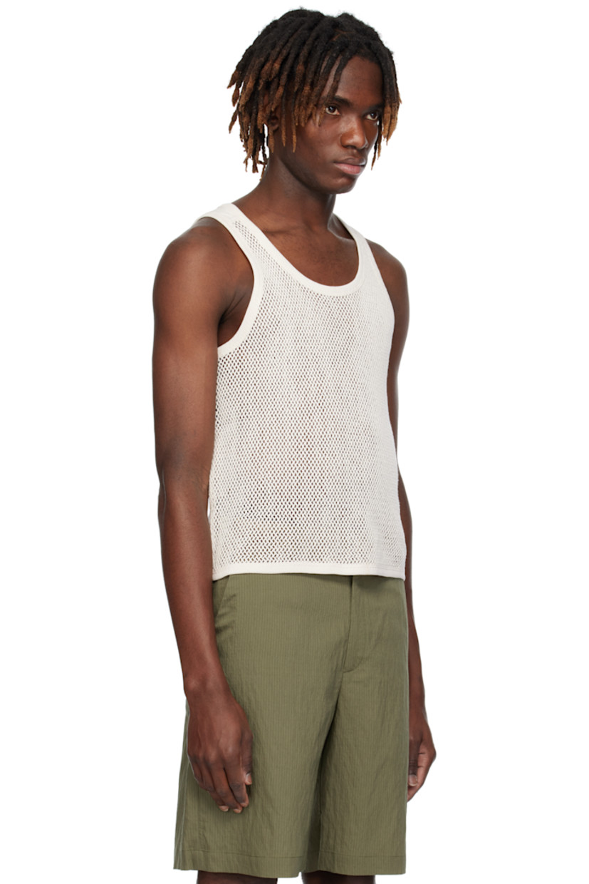 Organic cotton fishnet tank top. 

· Rib-knit scoop neck, hem, and armscyes
· Jersey panel at shoulders

Supplier color: White
