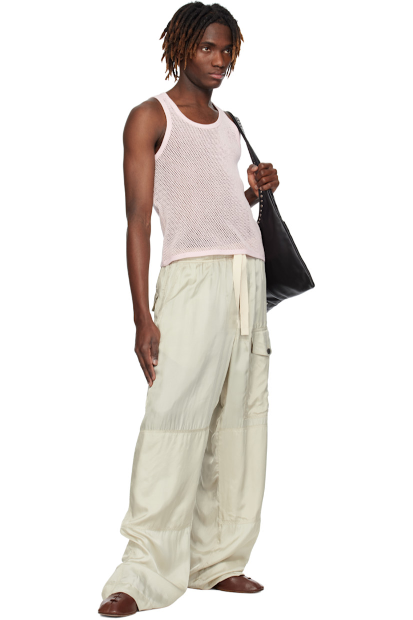 Organic cotton fishnet tank top. 

· Rib-knit scoop neck, hem, and armscyes
· Jersey panel at shoulders

Supplier color: Pink