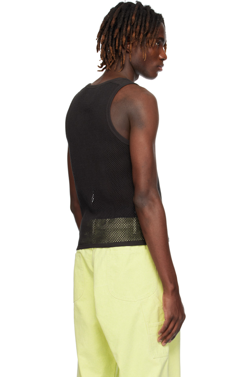 Organic cotton fishnet tank top. 

· Rib-knit scoop neck, hem, and armscyes
· Jersey panel at shoulders

Supplier color: Black