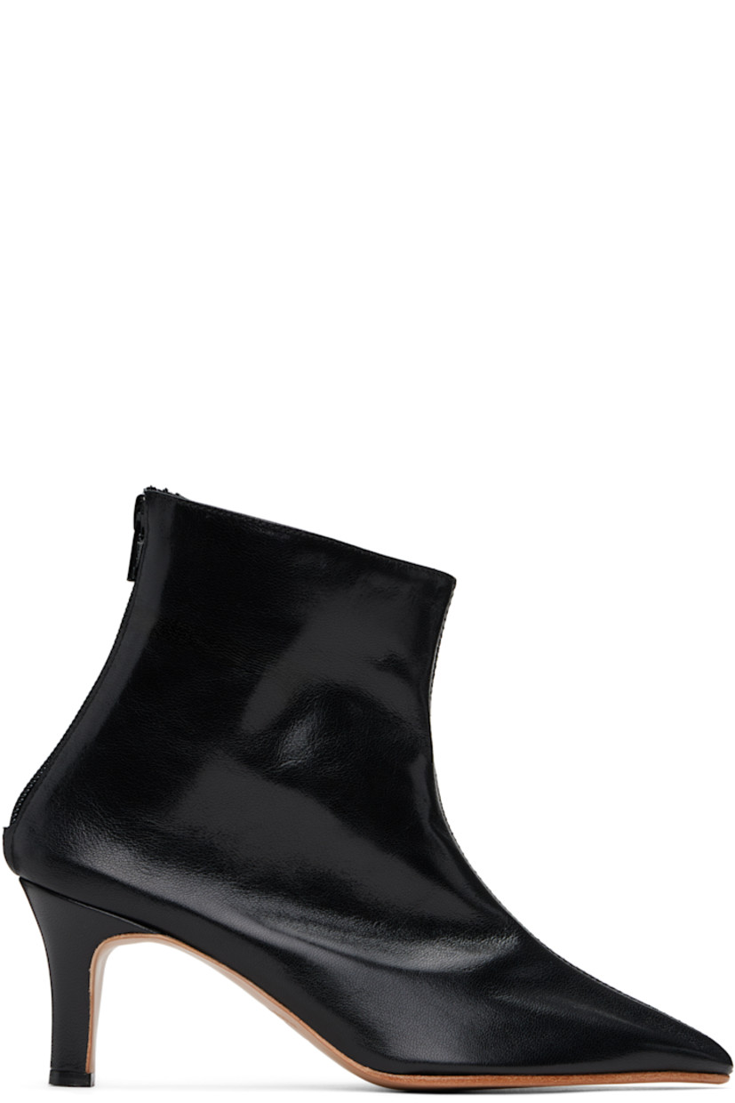Handcrafted ankle-high grained kidskin boots in black.

· Pointed toe
· Zip closure at heel counter
· Grained kidskin and suede lining
· Covered stiletto heel with rubber injection
· Leather sole
· Heel: H2.75"

Supplier color: Black