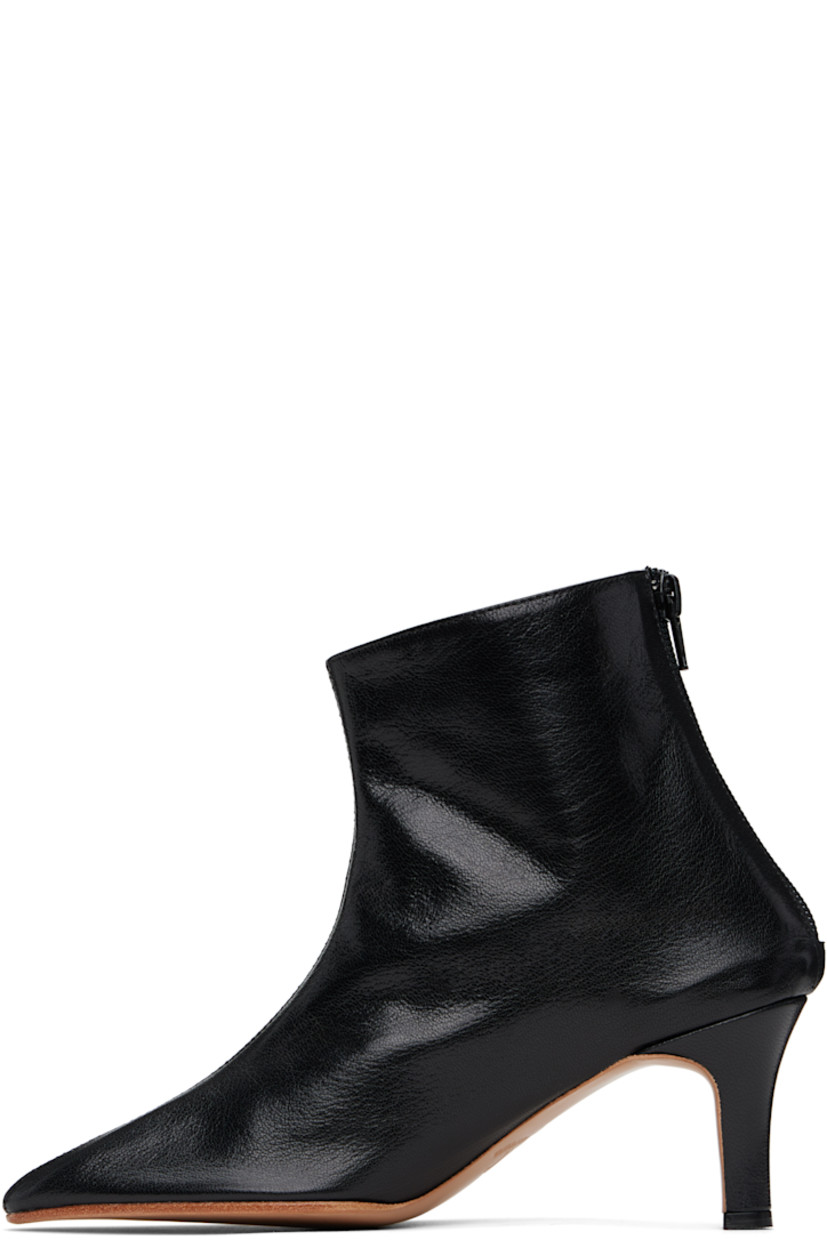Handcrafted ankle-high grained kidskin boots in black.

· Pointed toe
· Zip closure at heel counter
· Grained kidskin and suede lining
· Covered stiletto heel with rubber injection
· Leather sole
· Heel: H2.75"

Supplier color: Black