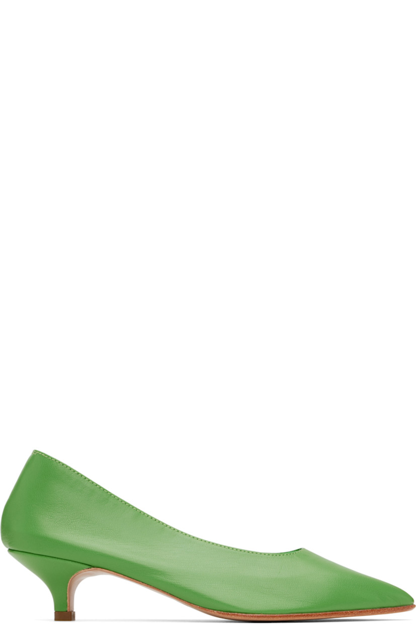 Handcrafted grained kidskin heels in green.

· Pointed toe
· Grained kidskin and suede lining
· Covered kitten heel with rubber injection
· Leather sole
· Heel: H1.75"

Supplier color: Bamboo