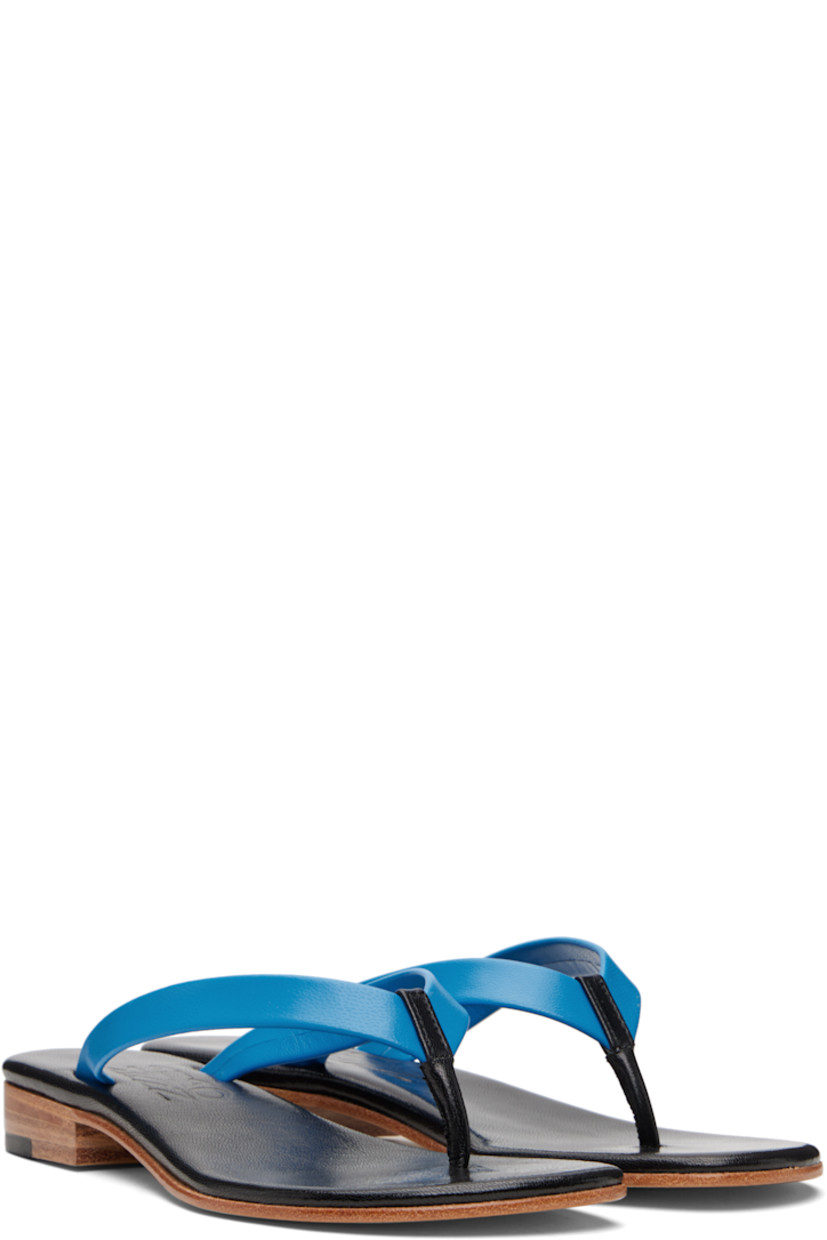 Buffed kidskin flip-flops.

· Open toe
· Thong-style strap
· Logo embossed at footbed
· Stacked leather heel with textured rubber injection
· Smooth leather sole

Supplier color: Olympic blue/Black