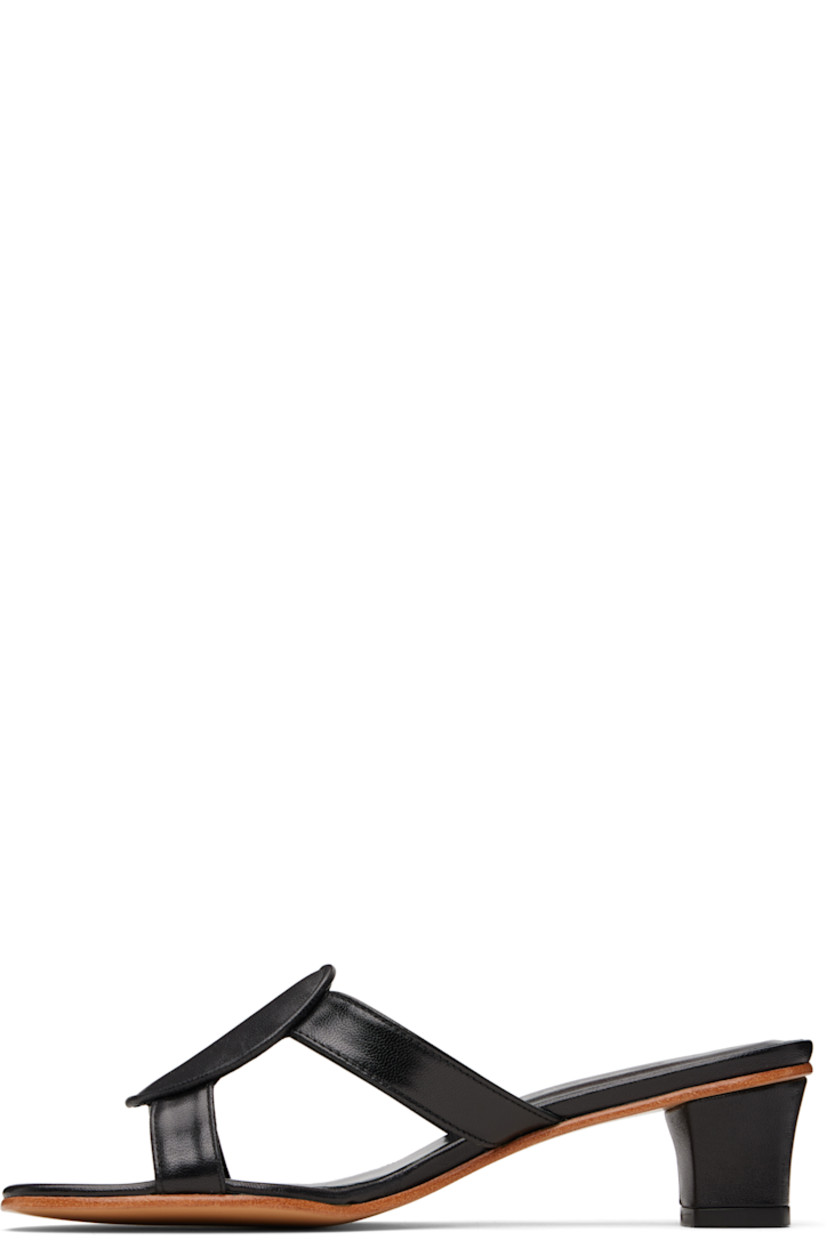 Buffed kidskin heeled sandals.

· Open toe
· Straps at vamp
· Logo embossed at padded footbed
· Covered heel with rubber injection
· Smooth leather sole
· Heel: H1.75"

Supplier color: Black