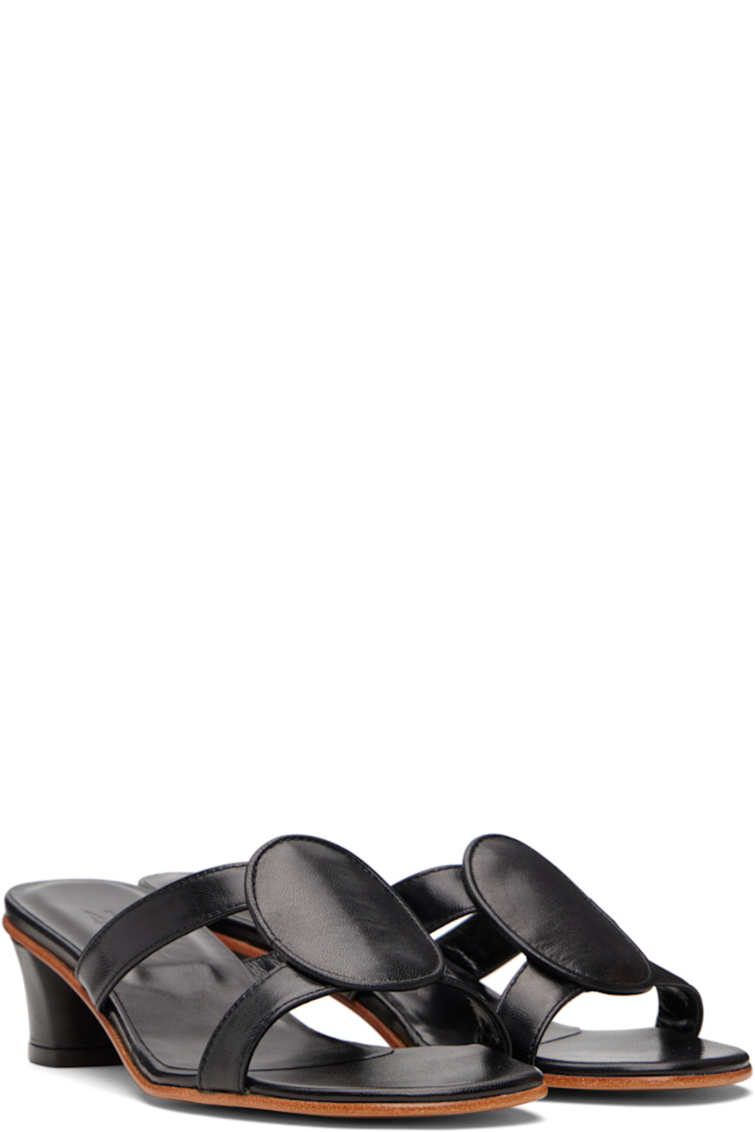 Buffed kidskin heeled sandals.

· Open toe
· Straps at vamp
· Logo embossed at padded footbed
· Covered heel with rubber injection
· Smooth leather sole
· Heel: H1.75"

Supplier color: Black